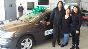 Recycled Rides, Allstate Insurance, and Gerber Collision helping a graduate family with a donated 2014 Nissan Sentra! 