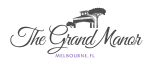 The Grand Manor Logo