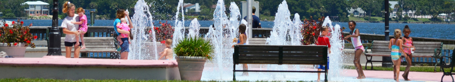 Children playing in the fountain